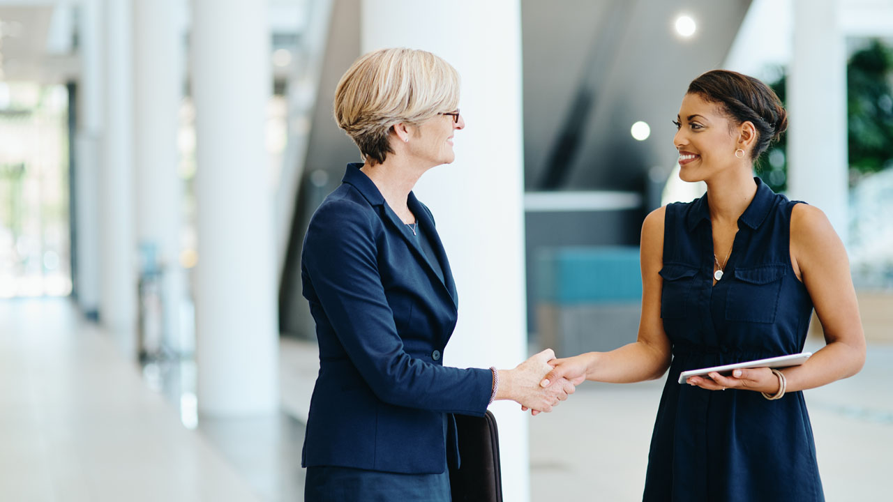 Two women talking to each other